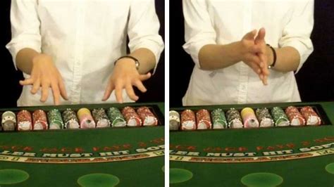 casino dealer clearing hands/